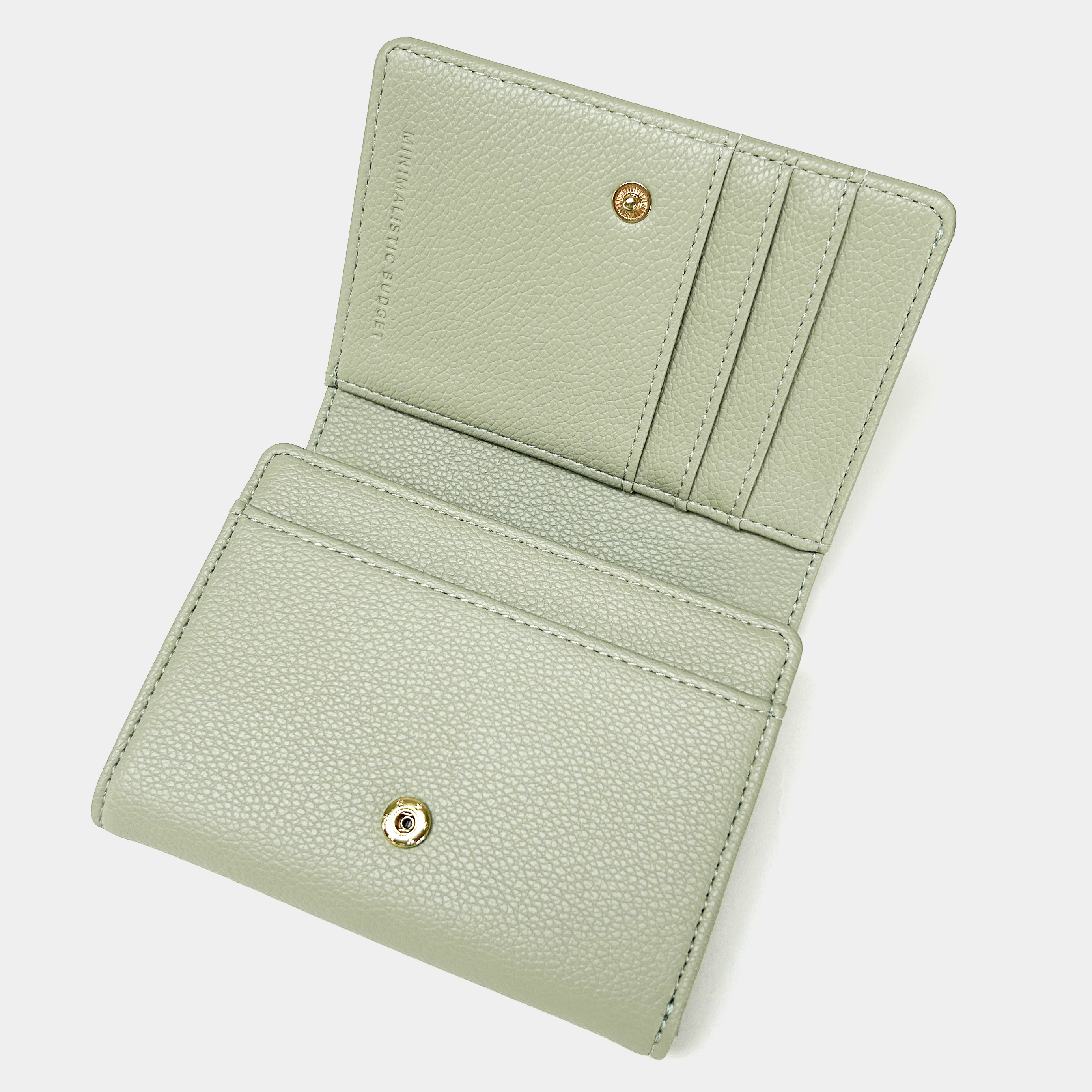 Light green wallet on a white background
